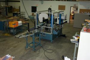 Walking beam machine with vision inspection, laser printing, tape and reel packaging