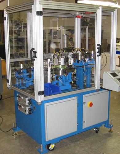 Dual dial assembly machine to assemble a plastic valve